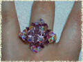 anello con fiori e cristalli bicono