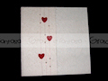 Album con carta effetto pizzo, cuori in feltro e perle.
